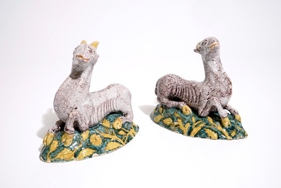 A pair of large Dutch Delft polychrome models of goats on a ground, 18th C.