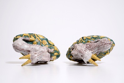 A pair of large Dutch Delft polychrome models of goats on a ground, 18th C.