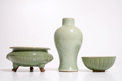 A Chinese Longquan celadon tripod censer, an underglaze-decorated vase and a bowl, Ming and later