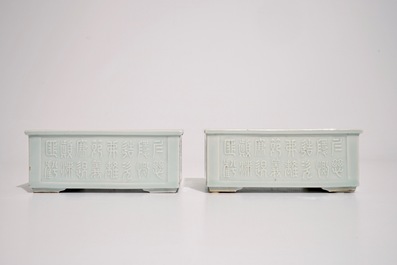 A pair of Chinese relief-decorated celadon-glazed rectangular jardinieres, Yongzheng mark, 19th C.
