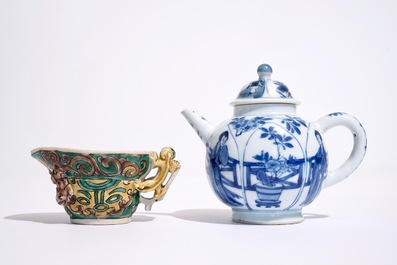 A blue and white Chinese teapot and cover and a verte biscuit libation cup, Kangxi