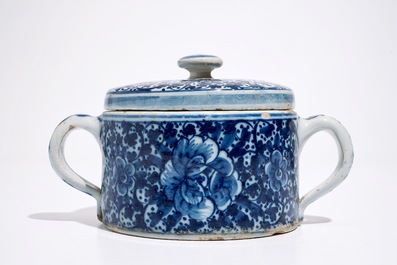 A Dutch Delft blue and white butter tub and cover and a small fluted plate, 18th C.