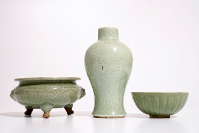 A Chinese Longquan celadon tripod censer, an underglaze-decorated vase and a bowl, Ming and later