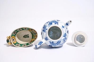 A blue and white Chinese teapot and cover and a verte biscuit libation cup, Kangxi