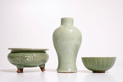 A Chinese Longquan celadon tripod censer, an underglaze-decorated vase and a bowl, Ming and later