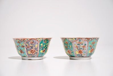 A pair of Chinese famille verte cups and saucers with floral ornamental design, Kangxi