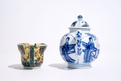 A blue and white Chinese teapot and cover and a verte biscuit libation cup, Kangxi