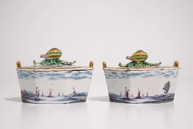 A fine pair of Dutch Delft polychrome petit feu butter tubs with snail-shaped finials, 18th C.