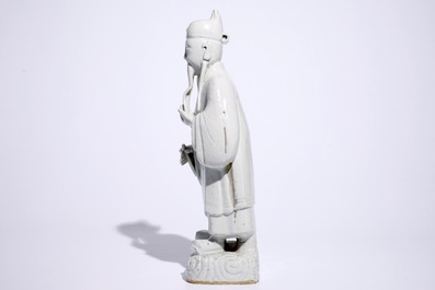 A pair of tall Chinese Dehua blanc de Chine figures of immortals, 18/19th C.