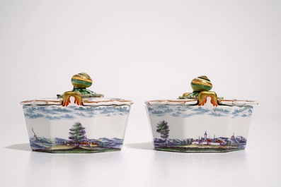 A fine pair of Dutch Delft polychrome petit feu butter tubs with snail-shaped finials, 18th C.