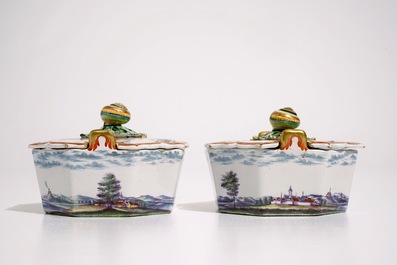 A fine pair of Dutch Delft polychrome petit feu butter tubs with snail-shaped finials, 18th C.