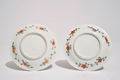 A pair of Chinese famille verte cups and saucers with floral ornamental design, Kangxi