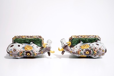 A pair of large polychrome Dutch Delft models of cows, 18th C.