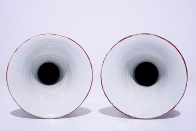 A pair of Dutch Delft polychrome petit feu Kakiemon-style vases, 18th C.
