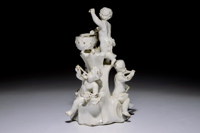 A white Delft group of putti playing music, probably German, 18th C.