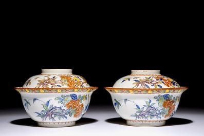 A pair of rare polychrome Dutch Delft bowls and covers, early 18th C.