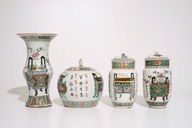 A set of matching Chinese famille verte vases and covers, 19th C