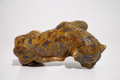 A Chinese glazed stoneware model of a tiger, probably Ming