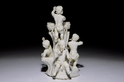 A white Delft group of putti playing music, probably German, 18th C.