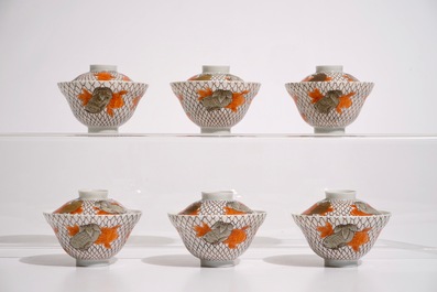 Six Japanese eggshell covered cups and saucers with carps, Meiji, 19th C.