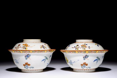 A pair of rare polychrome Dutch Delft bowls and covers, early 18th C.