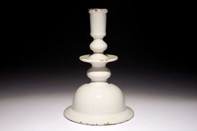 A rare large white Dutch Delft candlestick, 17th C.