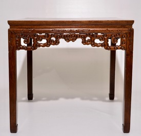 A Chinese carved hardwood table, 19/20th C.