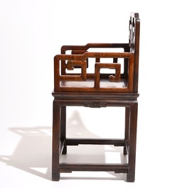 A pair of Chinese carved hardwood chairs, 19th C.