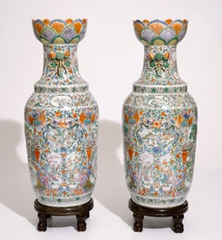 A pair of very large Chinese Canton rose-verte vases with lotus-shaped mouths, 19th C.