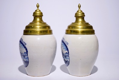 An exceptional pair of Dutch Delft blue and white tobacco jars &quot;Het Wapen van Zeeland&quot;, 18th C.