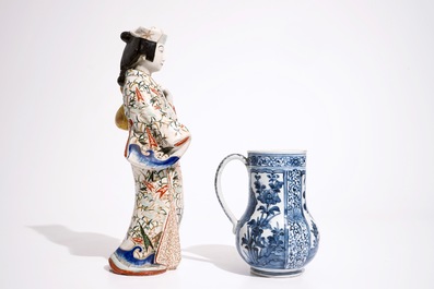 A blue and white Arita jug and a plate, 17/18th C., with an Imari figure, 18/19th C.