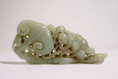 A Chinese pale celadon jade group of boys on a lingzhi, 19th C.