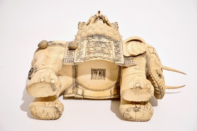 A large Chinese ivory group of Buddha seated on an elephant, late 19th C.