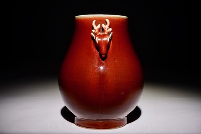 A Chinese monochrome sang-de-boeuf-glazed deer-handled hu vase, 19th C.