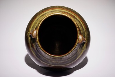 A Chinese monochrome tea-dust-glazed hu vase, Qianlong mark, 19th C.