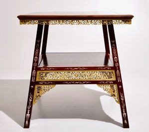 A Chinese parcel-gilt and sculpted wood table with bone inlay, 20th C.