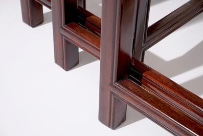 Un ensemble de quatre tables gigognes en bois sculpt&eacute;, Chine, 20&egrave;me