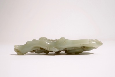 A Chinese pale celadon jade group of boys on a lingzhi, 19th C.