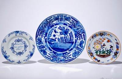 A Dutch Delft blue and white chinoiserie dish, an inscribed plate and a polychrome plate with floral design, 18th C.