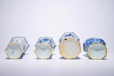 A Dutch Delft blue and white three-piece garniture and a large singular vase, 18th C.