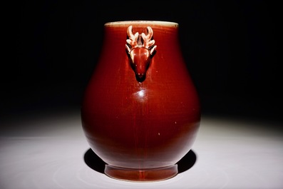 A Chinese monochrome sang-de-boeuf-glazed deer-handled hu vase, 19th C.