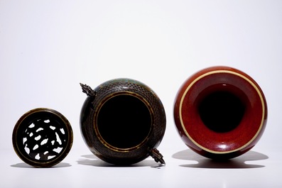 A Chinese monochrome oxblood vase and a bronze incense burner, 19th C.