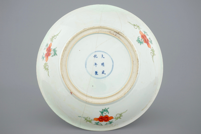 Two large Chinese blue and white and famille rose dishes, Kangxi and later