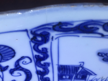 Een Chinese blauw-witte kraak porseleinen kom met vakverdeling van landschappen, Ming, Wanli