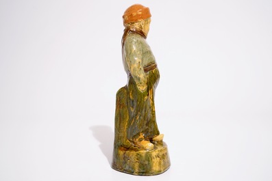 A Flemish pottery figure, &quot;The little farmer&quot;, prob. Laigneil workshop, 20th C.