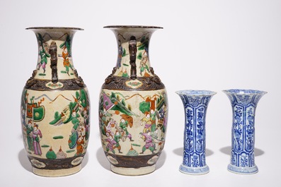 A pair of Chinese blue and white Kangxi vases and a pair of famille rose Nanking vases, 19th C.