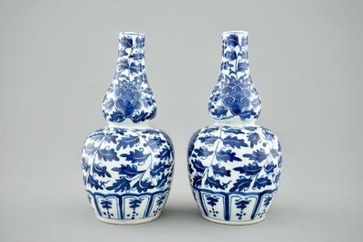 A pair of Chinese blue and white lotus scroll double gourd vases, Xuande mark, 19th C.
