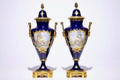 A pair of French ormolu-mounted covered vases in S&egrave;vres style, France, 20th C.