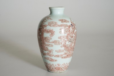 A Chinese vase with underglaze red with dragons among clouds, 19/20th C.