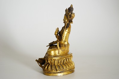 A Sino-Tibetan gilt bronze figure of Green Tara (Syamatara), 18/19th C.